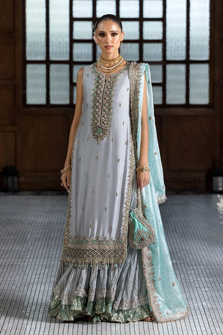 Pakistani party wear silk sharara suit.