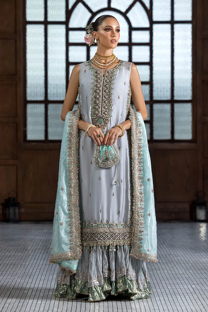 Pakistani party wear silk sharara suit.